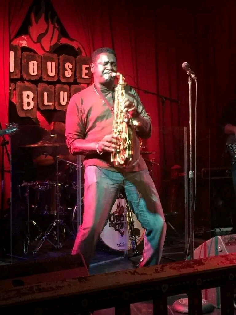 Wedding saxophonist performing live at an elegant event